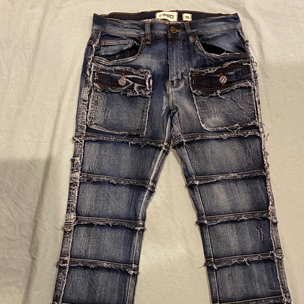 Distressed Blue Jeans with Black Accents